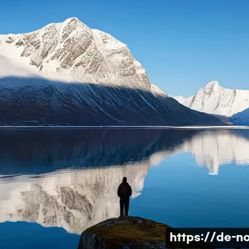 노르웨이에서의 종교와 신앙 생활 - A Solitary Moment of Spiritual Reflection in the Fjords**

A solitary person, dressed in warm, modes...